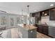 Modern kitchen with stainless steel appliances and granite island at 2510 Concord Cir, Lafayette, CO 80026