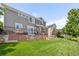 Spacious, fenced backyard with stone patio is perfect for outdoor entertaining at 14246 Piney River Rd, Broomfield, CO 80023