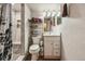 Bright bathroom with a walk-in shower featuring a tiled shower with built-in bench at 4759 Mt Princeton, Brighton, CO 80601