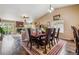 Bright dining area featuring a wood table, seating for six, and a vaulted ceiling at 4759 Mt Princeton, Brighton, CO 80601