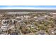 Aerial view of the neighborhood with mature trees and a glimpse of Sloan's Lake in the background at 1423 Xavier St, Denver, CO 80204