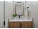 Contemporary half bath with a stylish vanity, modern fixtures, and quartz countertops at 1423 Xavier St, Denver, CO 80204