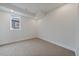 Minimalist bedroom with neutral carpet, a single window and recessed lighting at 1423 Xavier St, Denver, CO 80204