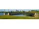 Scenic bridge view near green space and water features with city skyline in the background at 1423 Xavier St, Denver, CO 80204