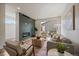 Cozy living room featuring a fireplace, contemporary furniture, and a sliding glass door at 1423 Xavier St, Denver, CO 80204
