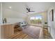 Bright living room featuring wood floors, a ceiling fan, and a walk out balcony at 1423 Xavier St, Denver, CO 80204