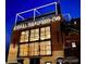 Exterior view of Odell Brewing Co. featuring lit signage and inviting architectural style at 1423 Xavier St, Denver, CO 80204