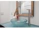 Bathroom featuring a vessel sink, modern faucet, and decorative accents at 1891 Curtis St # 1820, Denver, CO 80202