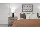 Bedroom featuring a nightstand and bed with decorative pillows at 1891 Curtis St # 1820, Denver, CO 80202