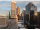 View of downtown featuring modern architecture in a vibrant metropolitan neighborhood with a sunny sky at 1891 Curtis St # 1820, Denver, CO 80202