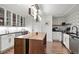 Well-equipped community kitchen with modern appliances and ample counter space at 1891 Curtis St # 1820, Denver, CO 80202