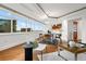 Open living and dining space features bright light and modern decor at 1891 Curtis St # 1820, Denver, CO 80202