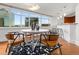 Stylish dining area boasts an open layout, city views, and modern decor at 1891 Curtis St # 1820, Denver, CO 80202