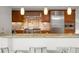 Gourmet kitchen features stainless steel appliances and granite countertops at 1891 Curtis St # 1820, Denver, CO 80202