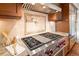 Gourmet kitchen features a stainless steel range and granite countertops at 1891 Curtis St # 1820, Denver, CO 80202