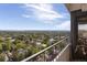 Balcony view showcasing Denver cityscape, mountain views, and blue skies at 130 N Pearl St # 1804, Denver, CO 80203