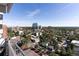 Beautiful City view highlighting lush greenery and distant city buildings at 130 N Pearl St # 1804, Denver, CO 80203