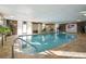 Inviting indoor pool area with brick accents, ample lighting, and a relaxing atmosphere at 130 N Pearl St # 1804, Denver, CO 80203