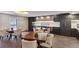 Well-appointed kitchenette with sleek cabinetry, stainless steel appliances, and stylish dining space at 130 N Pearl St # 1804, Denver, CO 80203