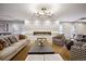 Spacious living room with a fireplace, comfortable seating, and modern decor at 130 N Pearl St # 1804, Denver, CO 80203
