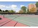 Well-maintained tennis court surrounded by lush greenery and scenic views at 130 N Pearl St # 1804, Denver, CO 80203