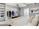 Comfortable bedroom featuring a spacious walk-in closet with ample shelving at 1888 S Jackson St # 604, Denver, CO 80210