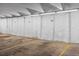 Well-lit parking garage with assigned spaces for residents at 1888 S Jackson St # 604, Denver, CO 80210