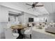 Bright living room featuring contemporary furnishings and a cozy dining area, perfect for entertaining at 1888 S Jackson St # 604, Denver, CO 80210