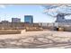 Spacious outdoor patio showcasing city views, perfect for relaxing or entertaining guests at 1888 S Jackson St # 604, Denver, CO 80210