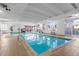 Well-maintained indoor pool with a clear blue water and visible 'no diving' sign at 1888 S Jackson St # 604, Denver, CO 80210