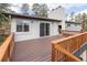 Expansive deck with wood railing, providing an ideal space for outdoor living at 721 Forest View Rd, Monument, CO 80132