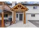 Inviting entryway featuring a striking wooden beam and trim at 721 Forest View Rd, Monument, CO 80132