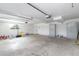 Spacious garage with ample storage and natural light, perfect for projects and parking at 721 Forest View Rd, Monument, CO 80132