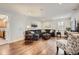 Comfortable living room with hardwood floors, recessed lighting, and a stylish sectional sofa at 8801 W 65Th Ave, Arvada, CO 80004