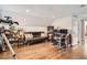 Bright living room features hardwood floors and comfortable seating, perfect for relaxing and entertaining at 8801 W 65Th Ave, Arvada, CO 80004