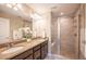 Double vanity bathroom with large shower at 821 Robert St, Longmont, CO 80503