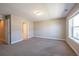 Bedroom with window, door to bathroom and closet at 821 Robert St, Longmont, CO 80503