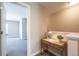 Small landing with a desk and view into bedroom at 821 Robert St, Longmont, CO 80503