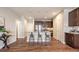 Modern kitchen featuring stainless steel appliances and an island at 821 Robert St, Longmont, CO 80503