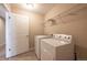 Convenient laundry room with washer and dryer at 821 Robert St, Longmont, CO 80503