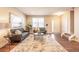 Spacious living room with hardwood floors and modern furniture at 821 Robert St, Longmont, CO 80503