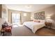 Spacious main bedroom with private balcony access at 821 Robert St, Longmont, CO 80503