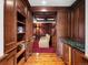 Hallway with built-in bookshelves and a home theater visible at 1880 Mallard Dr, Broomfield, CO 80020