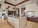 Gourmet kitchen with a large island, stainless steel appliances, and custom cabinetry at 1880 Mallard Dr, Broomfield, CO 80020