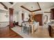 Gourmet kitchen featuring a center island with pendant lights, and a stone tiled floor at 1880 Mallard Dr, Broomfield, CO 80020