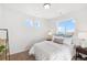 Bright bedroom with great natural light with a view and a minimal decor at 22063 E 38Th Pl, Aurora, CO 80019