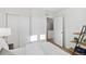 Bedroom with closet, shelves, access to upper floor, and natural light at 22063 E 38Th Pl, Aurora, CO 80019