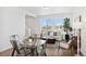 Inviting living room with large windows for natural light and stylish furnishings for a comfortable atmosphere at 22063 E 38Th Pl, Aurora, CO 80019