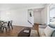 Spacious living area featuring modern furnishings, natural light, and an open layout, ideal for relaxation and entertaining at 22063 E 38Th Pl, Aurora, CO 80019