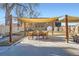 Outdoor patio with a shaded seating area perfect for entertaining at 7070 W 39Th Ave, Wheat Ridge, CO 80033